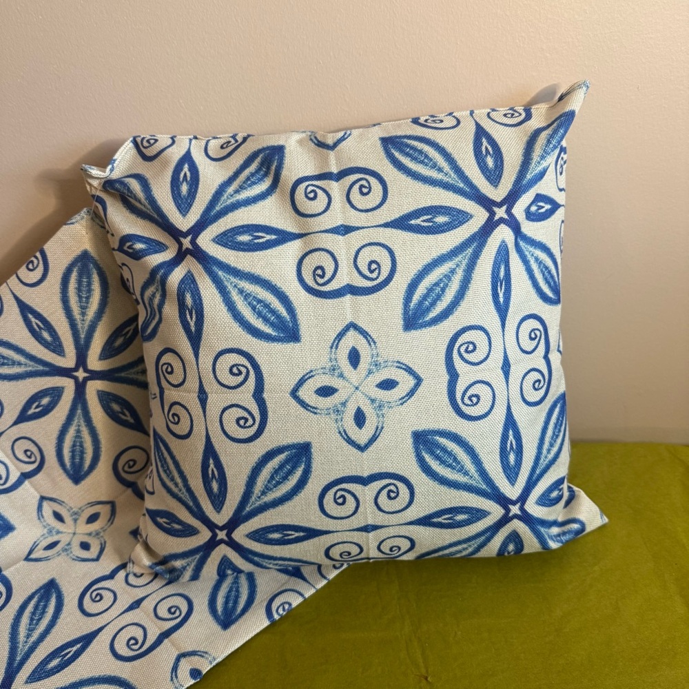 Blue and White Patterned set of Pillow Covers.